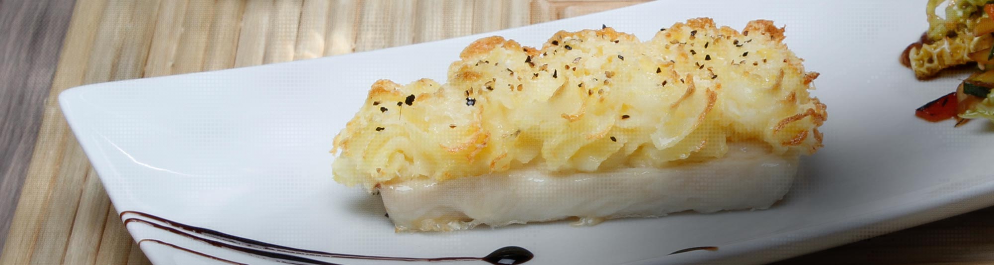 Filetto di Merluzzo in crosta di Duchessa di patate