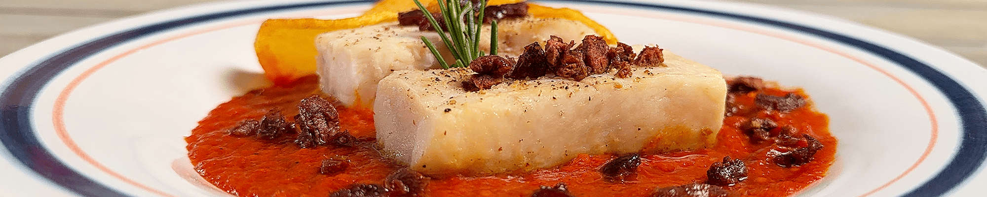 ricette/ricette-nasello/nasello-con-pomodori-e-chips-di-patate