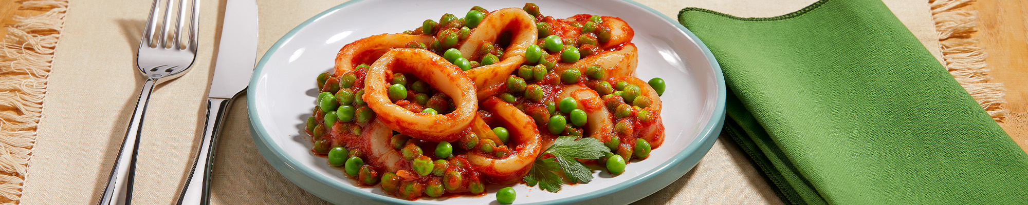 Totani e piselli in salsa di pomodoro