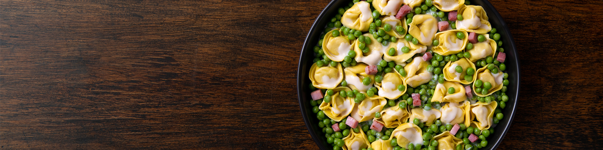 Tortellini panna, piselli e prosciutto – ricetta